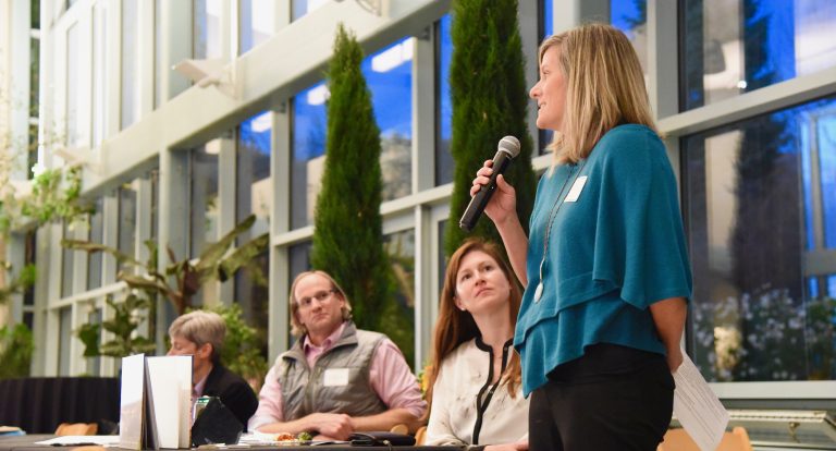 Brenda Bowen addresses water forum attendees while Steve Burian and Andrea Brunelle look on